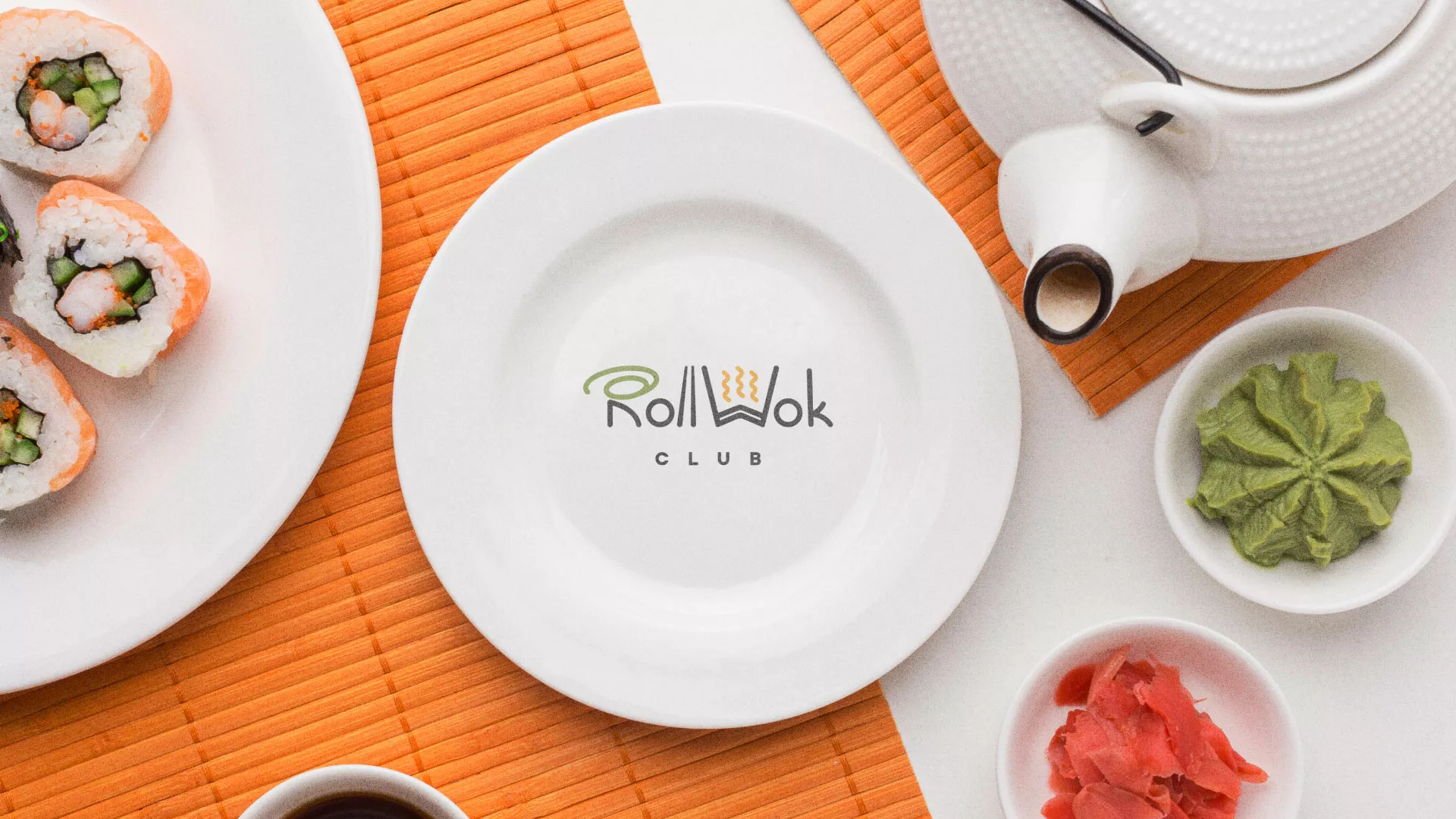Разработка логотипа и фирменного стиля в Вельске для суши-бара «Roll Wok Club» Разработка логотипа и фирменного стиля в Вельске для суши-бара «Roll Wok Club»